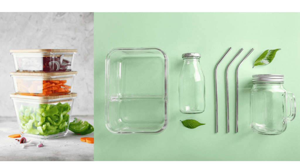 Stacked glass food containers with vegetables and reusable drink containers and metal straws on a green background.