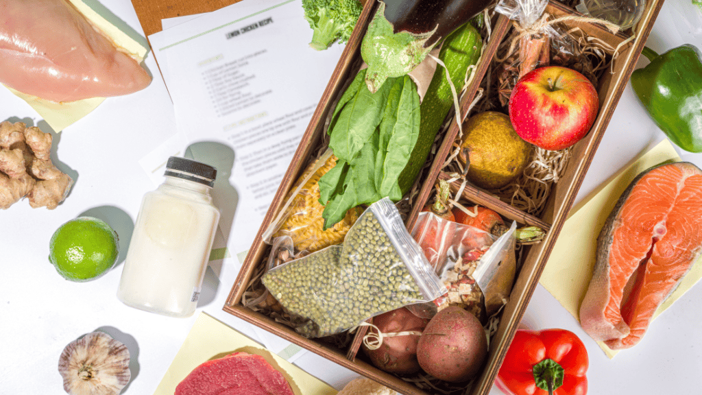 Assorted nutritious ingredients and a meal plan spread on a table.