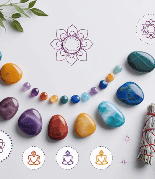 A variety of colorful crystals, incense, rolled towels, and chakra meditation symbols are arranged neatly on a white surface, creating a serene and balanced atmosphere focused on wellness and mindfulness.