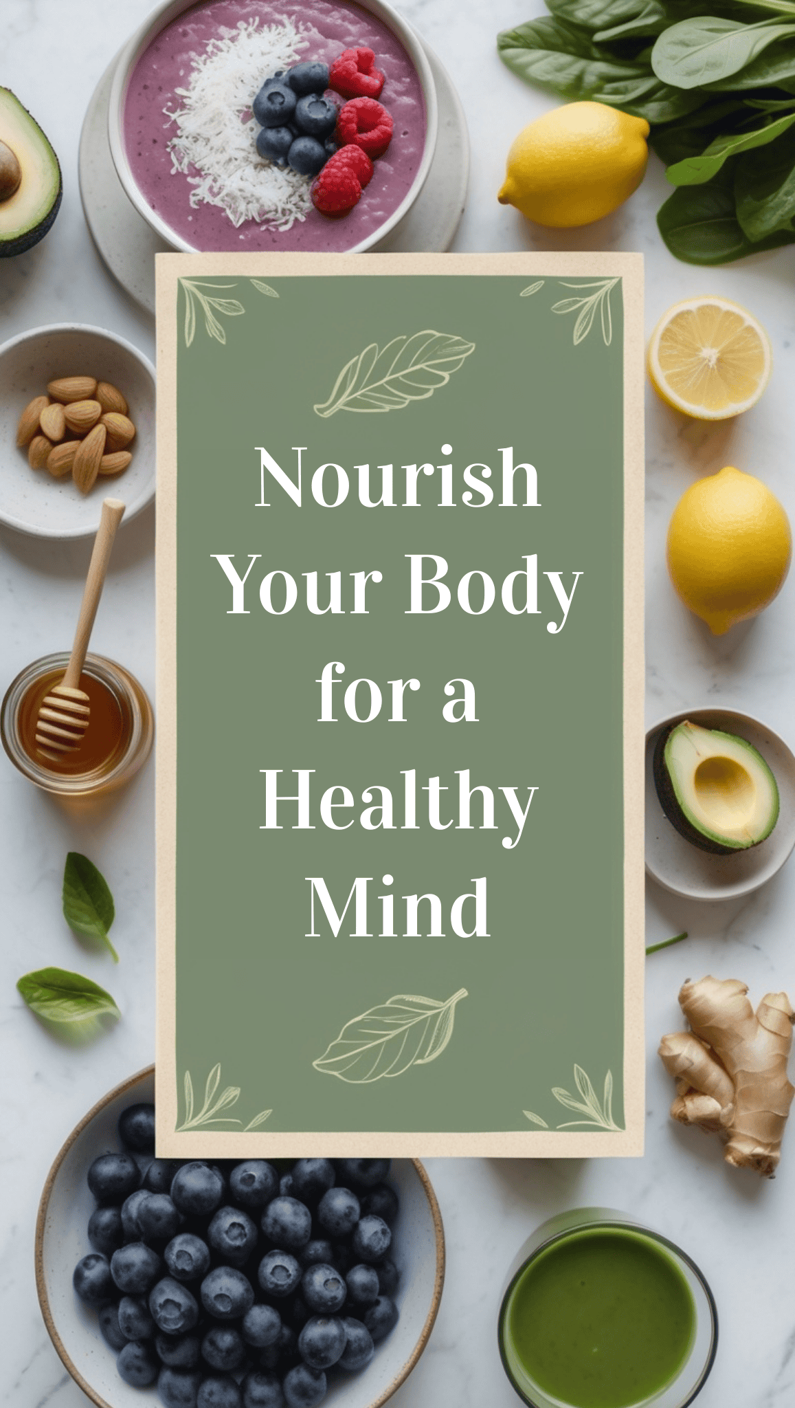 A flat lay of healthy foods—smoothies, lemons, honey, almonds, blueberries, spinach, avocado, and ginger—surrounds a green sign that reads “Nourish Your Body for a Healthy Mind,” promoting self-care and a positive mindset.