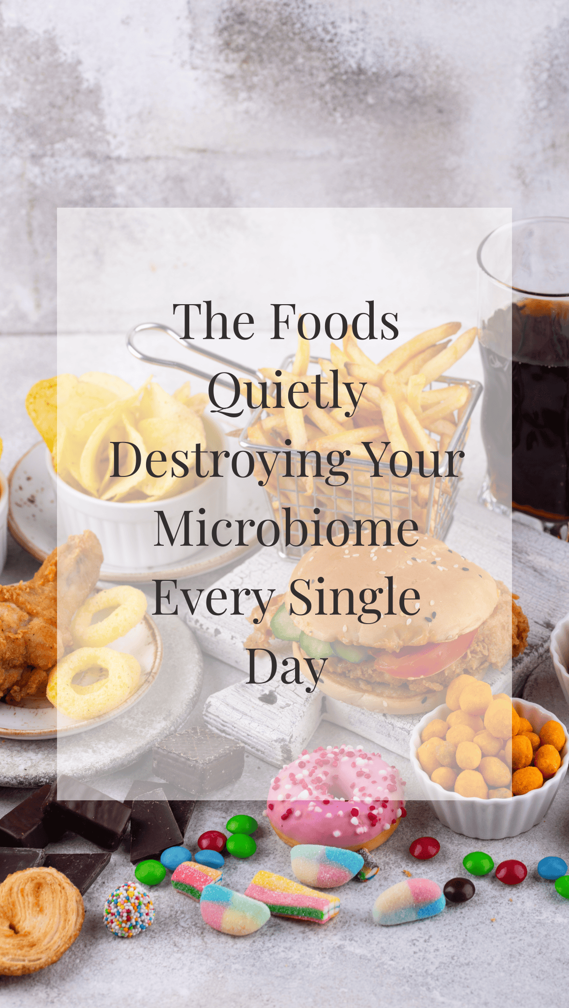 A variety of junk foods, including burgers, fries, chips, soda, fried chicken, candy, and chocolate, are displayed on a table. The text overlay reads: The Foods Quietly Destroying Your Healthy Gut Habits Every Single Day.